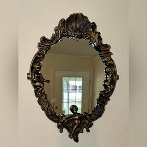 1970s Decorative 3-D cherub mirror Made in Hong Kong
